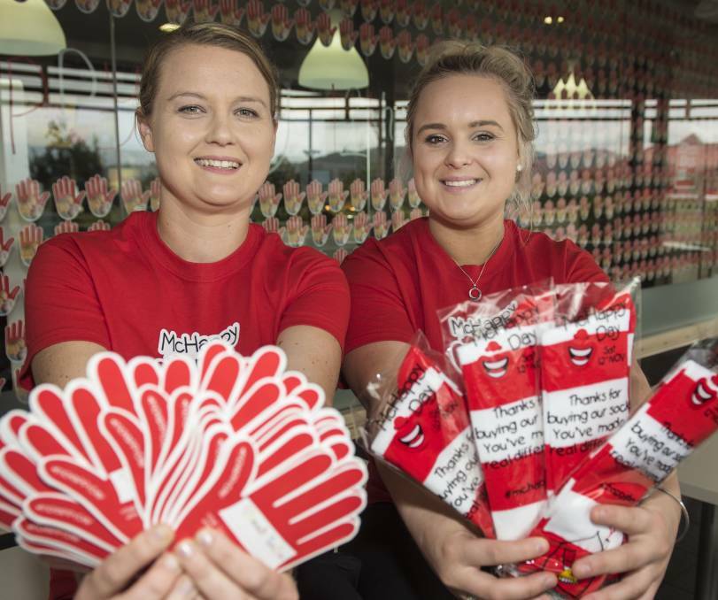 FUNDRAISER: Tamworth's Emily Crompton and Stephanie Wilson ahead of McHappy Day in November, which raised a record amount for the charity. Photo: Peter Hardin
