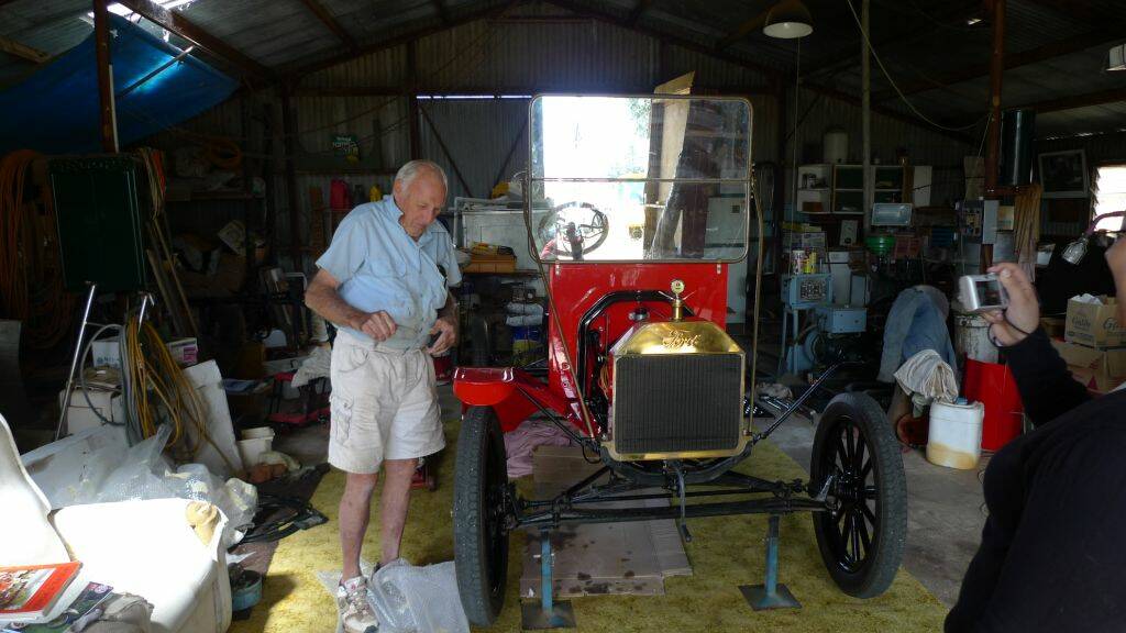 Allan Wright tinkers in the shed.