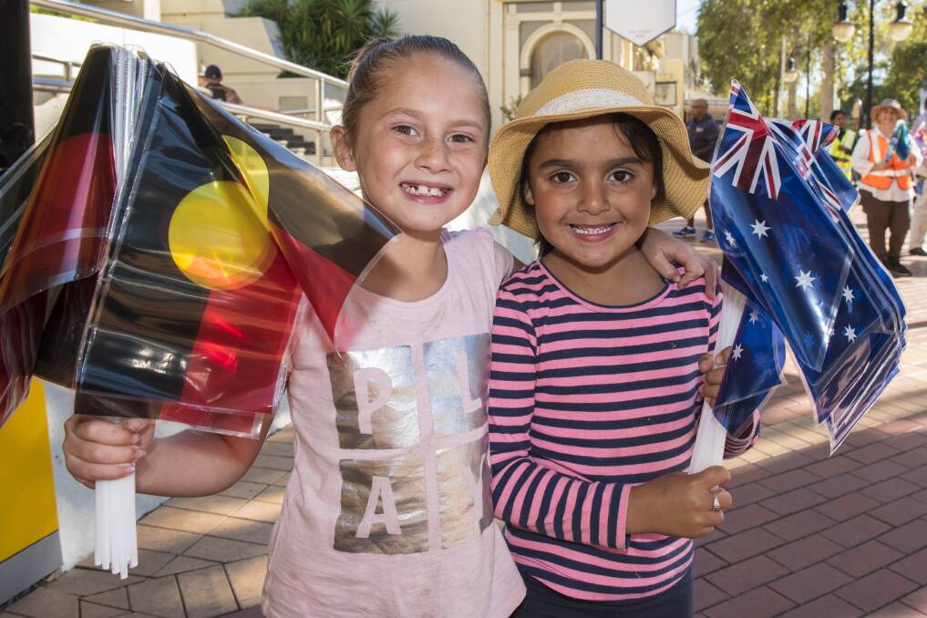 RECONCILIATION: Maliah and Savannah Shipley take part in The Long Walk to mark the start of Reconciliation Week. Photo: Peter Hardin