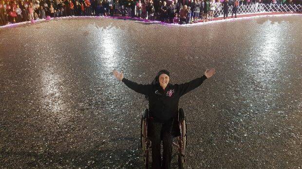 Connie Johnson in a sea of 5c coins, worth more than $2 million.  Photo: Facebook/Love Your Sister