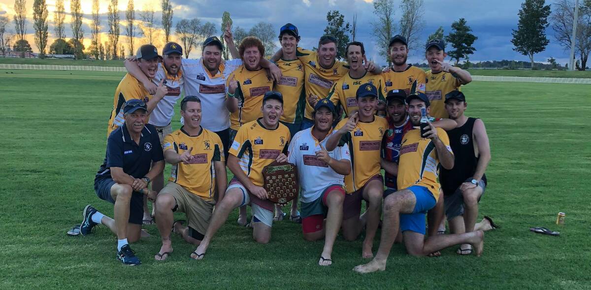 VICTORIOUS: Easts celebrate landing the Armidale Cricket one day trophy after escaping with a win in the final against City on Sunday at the Sportsground.