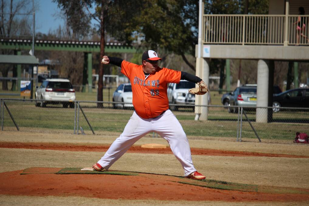 STEPPING UP: Armidale Outlaws B grade player Jeremy Bird pitching in last Saturday's semi-final against the Warriors. 