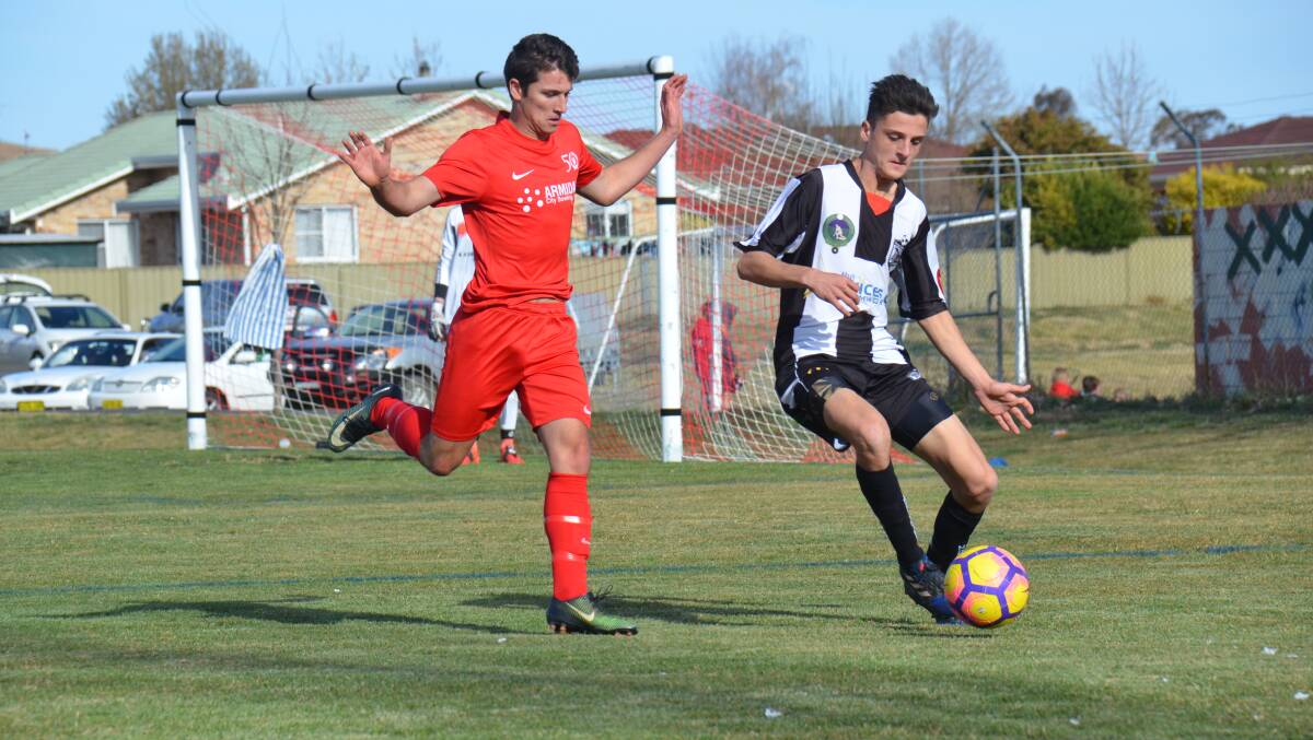 FOOTWORK: Northies' Harry Pollock in action against Norths United's Cody McCann. 
