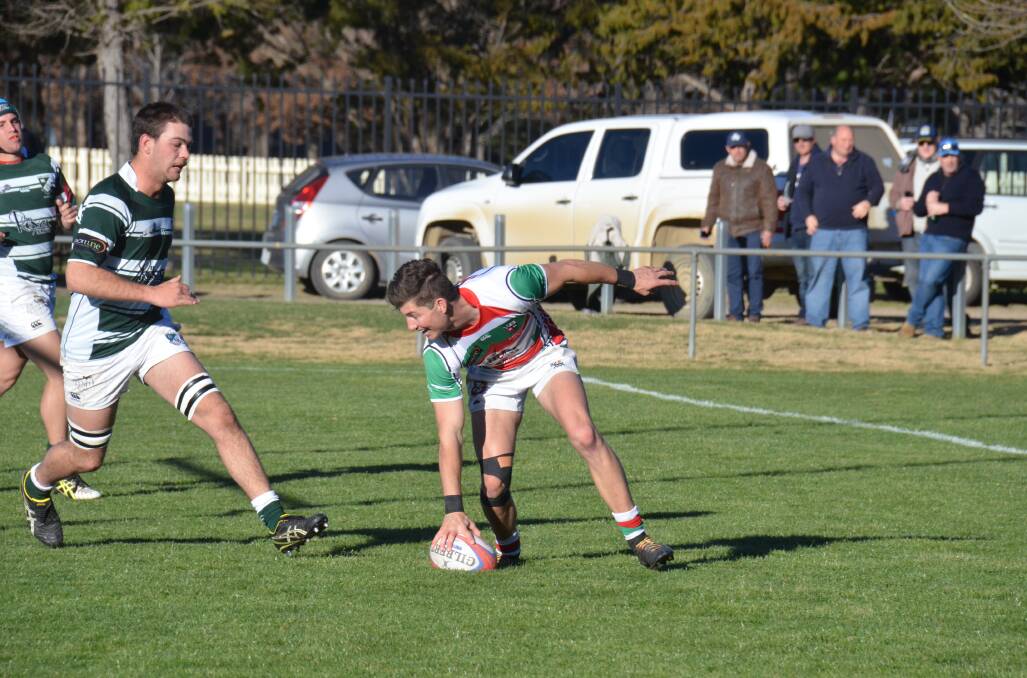 TRY TIME: James Reynolds plants the ball down for Albies in their round 13 clash against Robb College on Saturday.