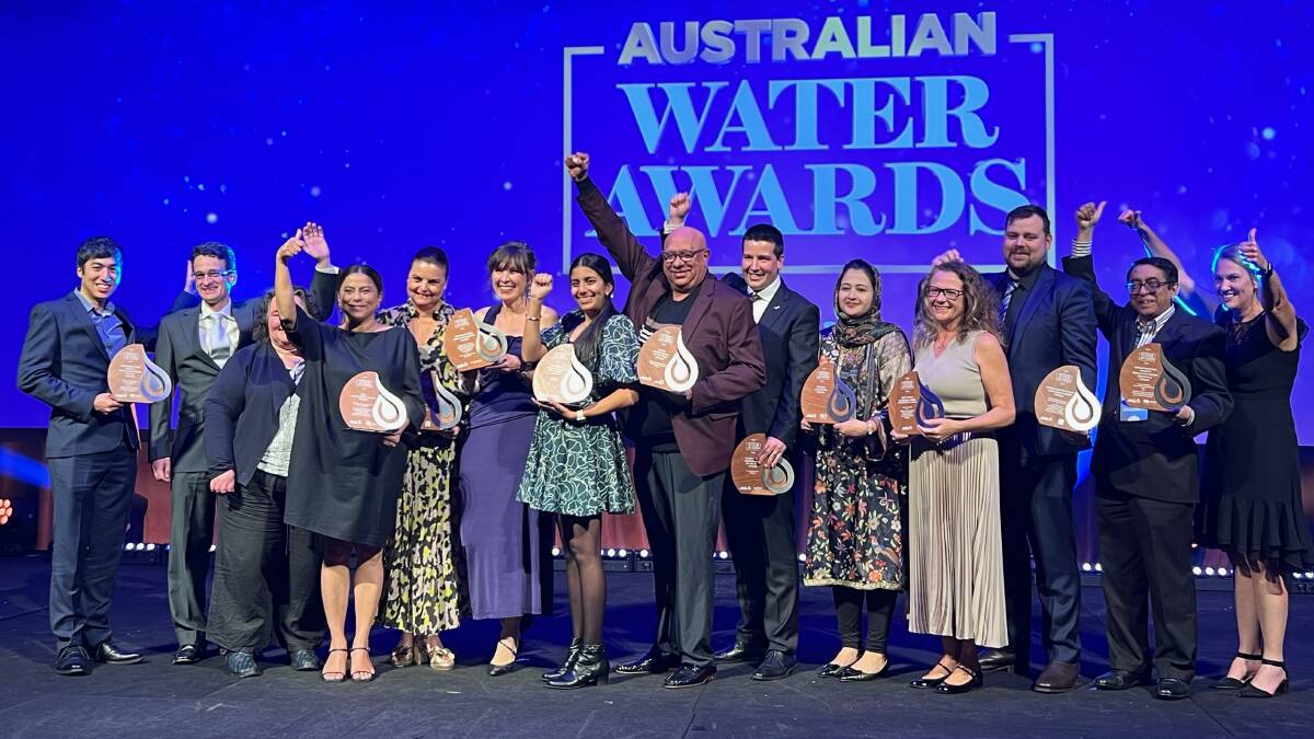 Phil Duncan (centre) with other award winners at the Oz Water gala night. 