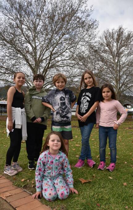 Out and about: Freya Cocharane, Bryce Shaw, Jay Sean-Cocharane, Chelsea Cocharane, Layla Cocharane and Ava-taylor Cocharane enjoyed a day out in damp Tamworth. Photo: Andrew Messenger