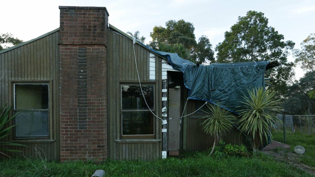 OUT OF HOME: Kellie Hancock's Teralba home was in the path of destruction during last year's Hunter super storms. Picture: Simone De Peak