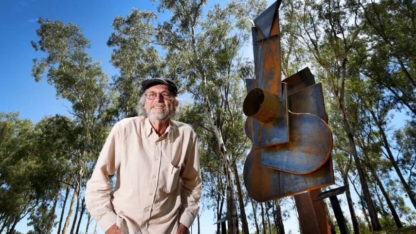 Local artist Peter Hooper with Tamworth's second big guitar