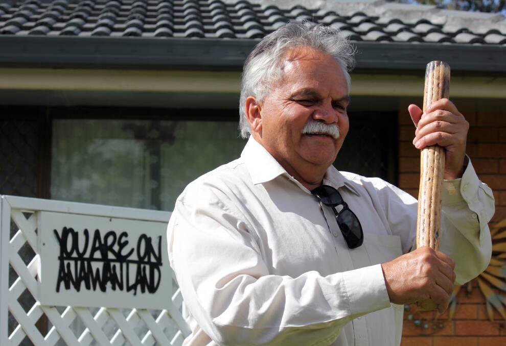 WALKING FOR HIS NATION: Anaiwan elder Steve Widders holds a traditional message stick, a nod to his ancestral history. Mr Widders has been selected to walk in the 2018 Gold Coast Commonwealth Games Queen's Baton Relay.
