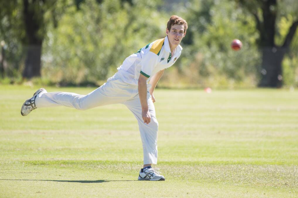 Steaming in: Lachlan Davidson bowls for Farrer in the quarter-final. Davidson later top-scored with 25 in the one-wicket win. Photo: Peter Hardin. 220217PHA025