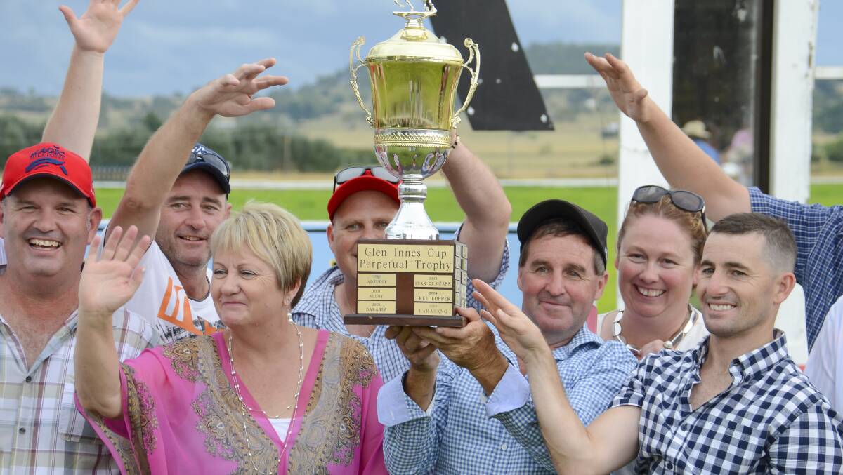 Winning touch: Paddy Cunningham, pictured here holding the Glen Innes Cup, added the Deepwater Cup on Saturday to his collection courtesy of Carry Me Gee Gee. Picture: Tony Grant.