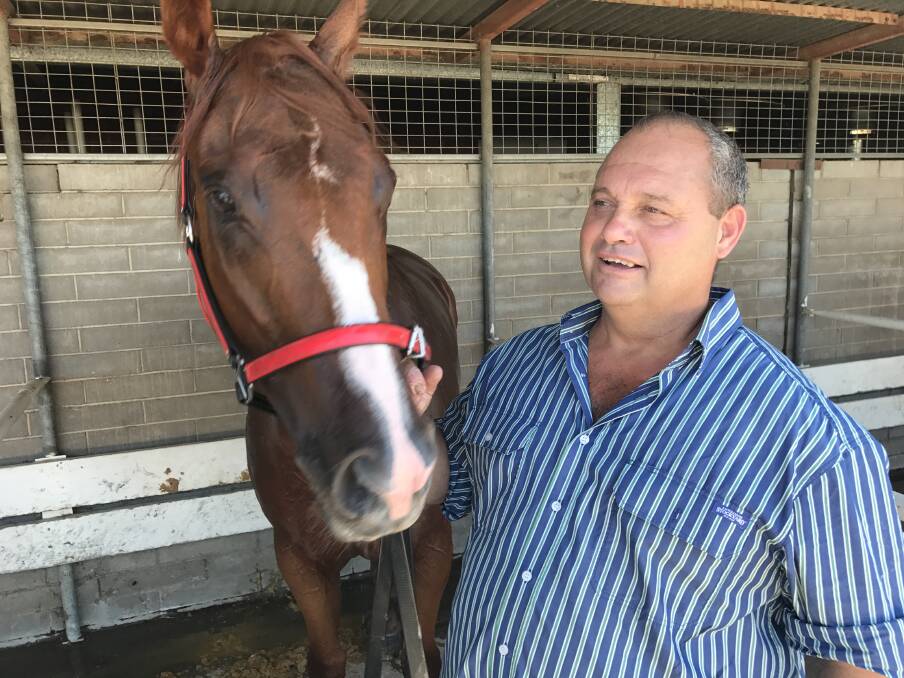 You're the champ: Tamworth trainer Mark Mason and his Country Championships contender De La Hoya, named after the legendary boxer.