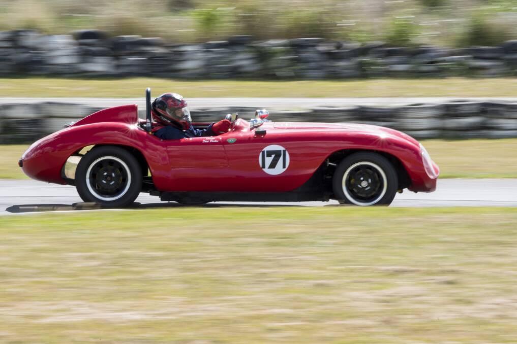 Tearing along: David Parker enjoys life in the driver's seat of his stylish red Milano during the Tamworth Sporting Car Club Lap Dash. 230417PHC196