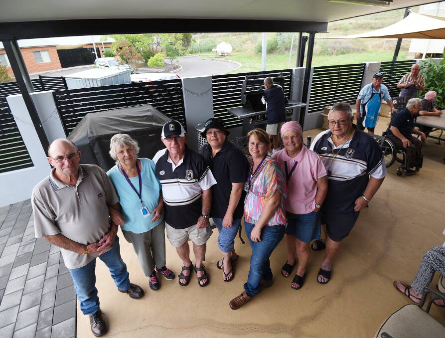 Top night: Bob Sully, Eleanor Sully, Kevin Robinson, Kath Kerr, Monica Forman, Janice Williams and Peter Johnson at the Men of League barbecue. Photo: Gareth Gardner