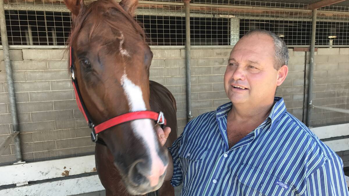 Lightning bid: Mark Mason, pictured here with De La Hoya after his win at Tamworth on Monday, has elected to head to Walcha with speedster Hot Hit on Friday. 