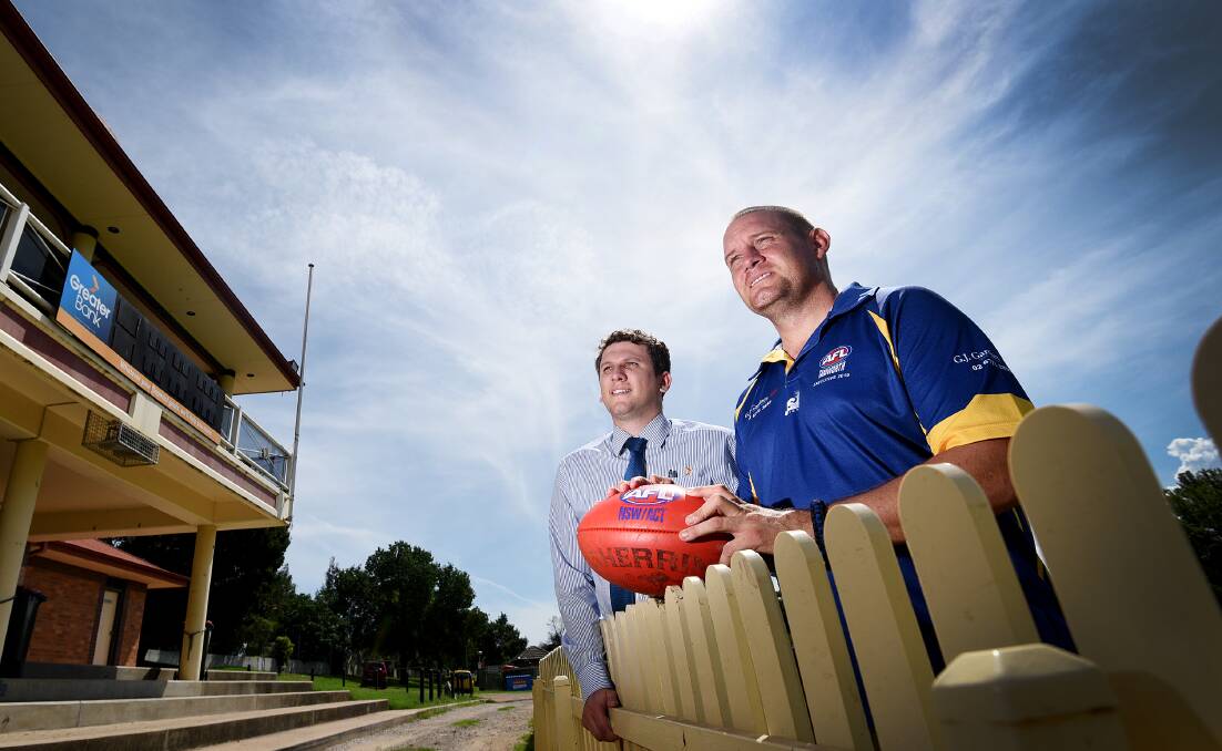 New deal: Greater Bank Tamworth branch manager Mitchell Balderston and AFL North West vice-president Josh McKenzie. Greater Bank has signed on as the league's major sponsor for the 2017 season.