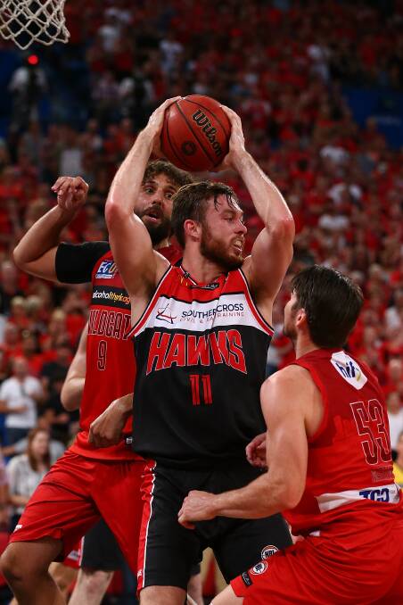 Challenge ahead: Nick Kay and his Wollongong Hawks went down 89-77 to Perth Wildcats in the NBL grand final opener on Sunday night. Photo: Getty Images