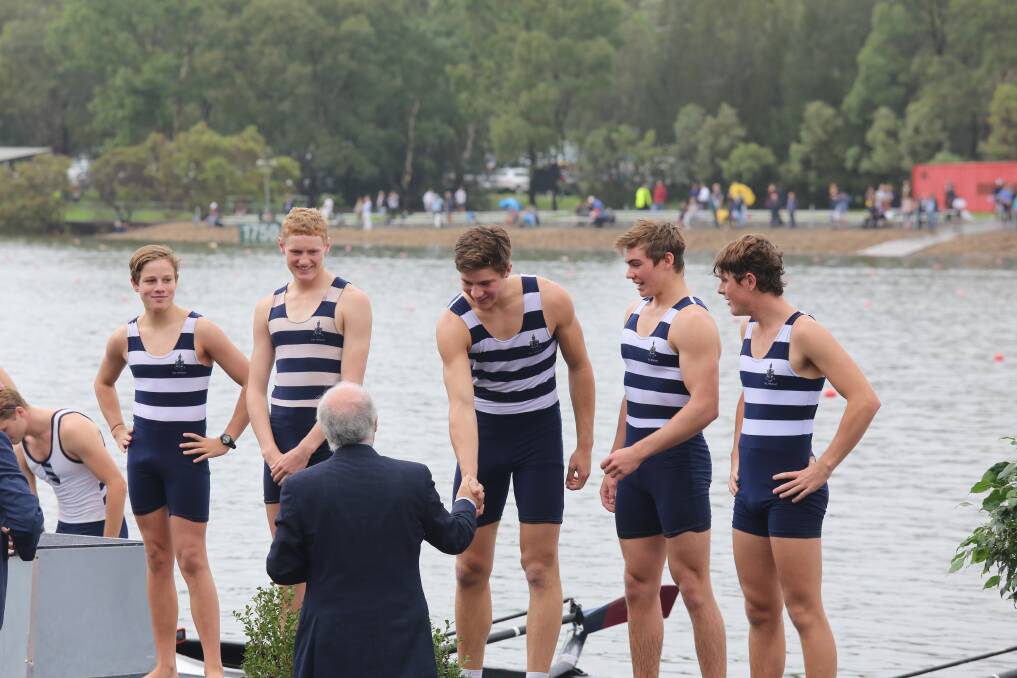 Impressive: The TAS First IV crew being congratulated on the podium at the AAGPS Head of the River Regatta staged in Sydney on Saturday.