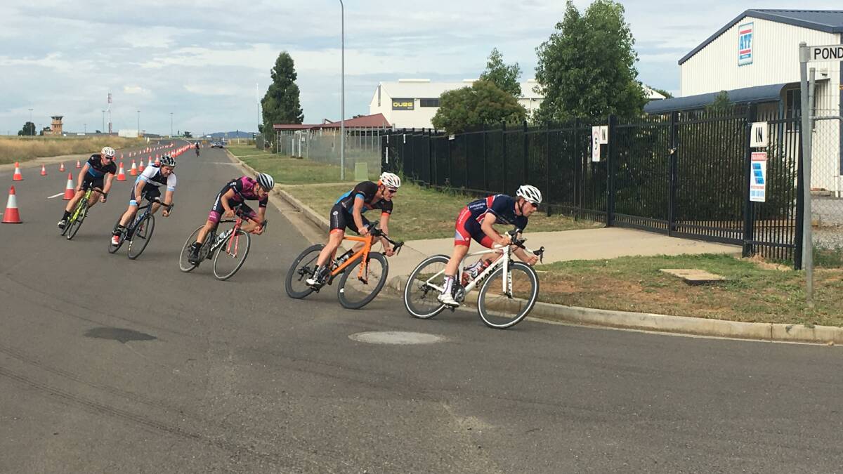 Driving forward: Cootamundra's Marty Ryan heads the chasing A-grade pack in the Tamworth Cycle Club Criterium at Goddard Lane on Sunday. Photo: Breanna Chillingworth