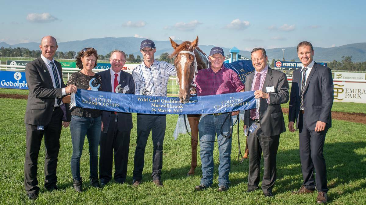 Pelerin with trainer Cody Morgan and officials after Sunday's Wild Card success at Scone. Photo: Katrina Partridge Photography.