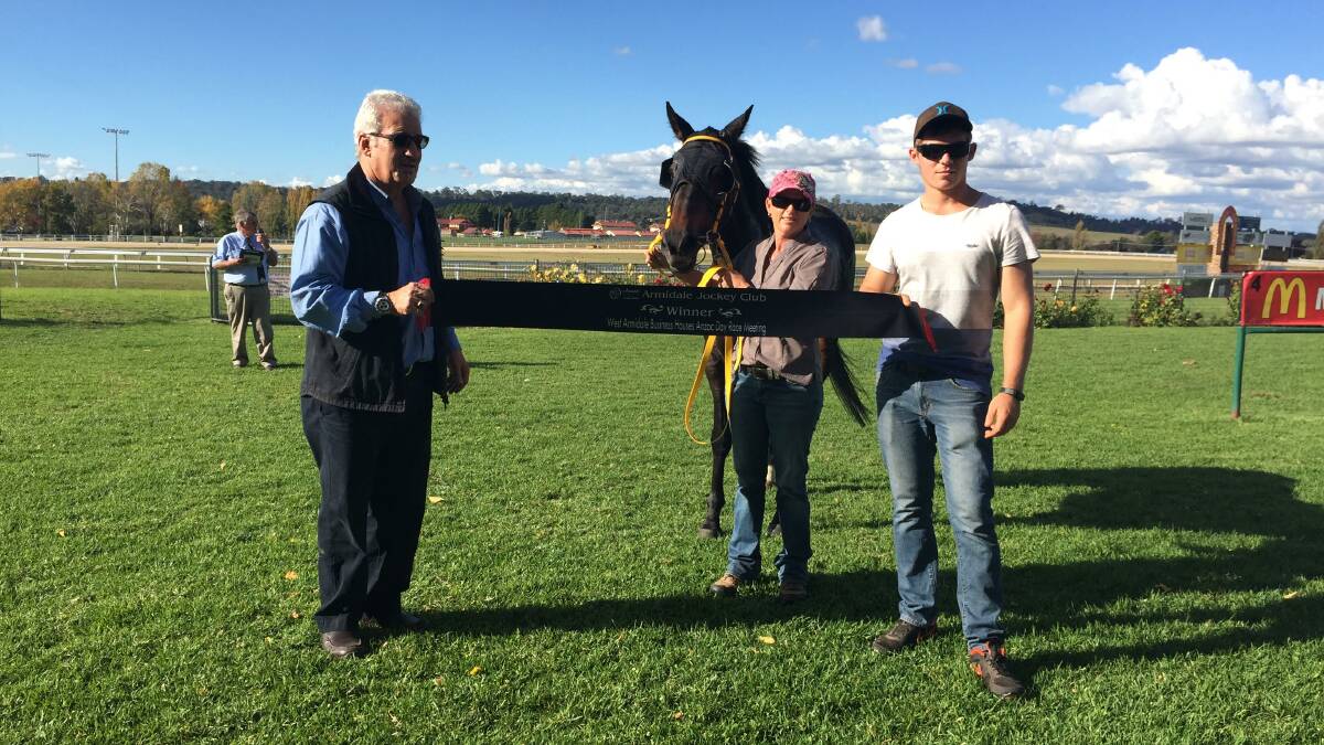 Top win: Gunnedah mare Supreme Goddess landed a deserved success for trainer Sally Torrens (holding the horse) at Armidale on Anzac Day. Photo: Ellen Dunger.