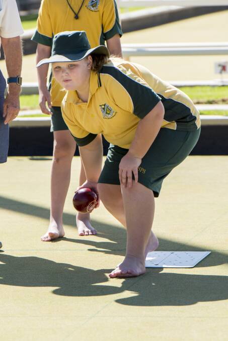 Hitting the green: Kayla Hunt was one of 20 Tamworth South Public School students that participated in Wednesday's session. Photo: Peter Hardin 150317PHF079