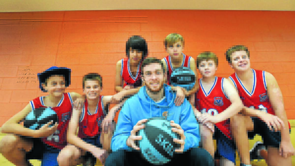 Nick Kay and some West Tamworth basketballers (from left) Kaidan Winsor, Brayden Silvester, Jye Kahaki, Jayden McGrath, William Whitten and Marcus Ryan during a visit home in 2016. 