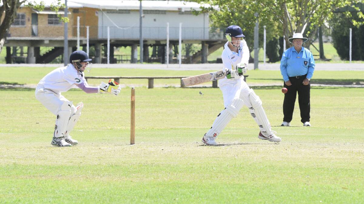 Mitch Henderson cuts during his half century for the under 16 gold.