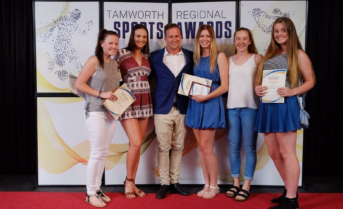 Winning shot: Members of the Young Team of the Year-winning Tamworth U17s netball side with special guest Lachlan Tame. Photo: Chasing Summer Photography