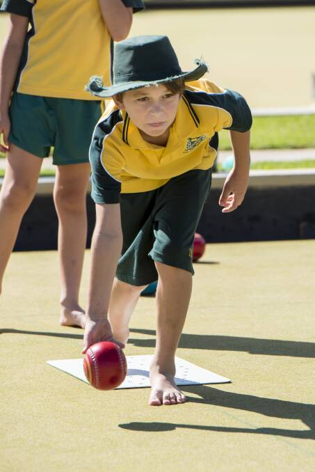 Rolling down: Jerome Aslin gets set to play this shot during Wednesday's coaching session at the South Tamworth Bowling Club. Photo: Peter Hardin 150317PHF047. 
