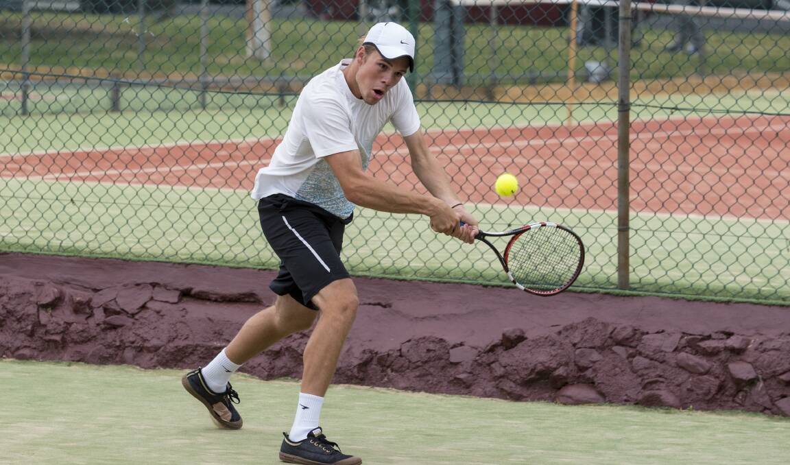 Winner: Corey Gaal looks to power this backhand back during his three sets win in Monday's AMT mens singles final.