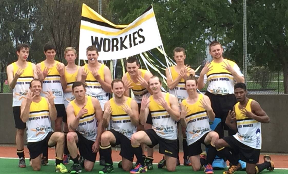 Groundhog day: Services Workies celebrate after claiming their eighth straight Tamworth mens first grade premiership on Sunday.