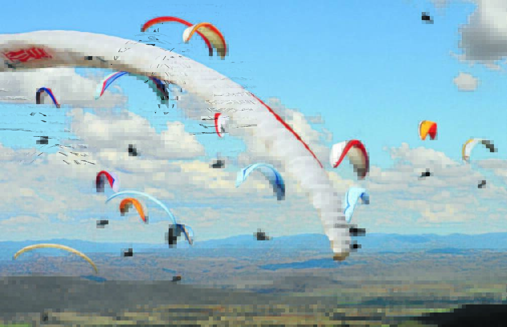 Colouring the sky: Paragliders will be a common sight in the skies around the region over the next week with the Manilla XC Camp getting underway on Saturday.