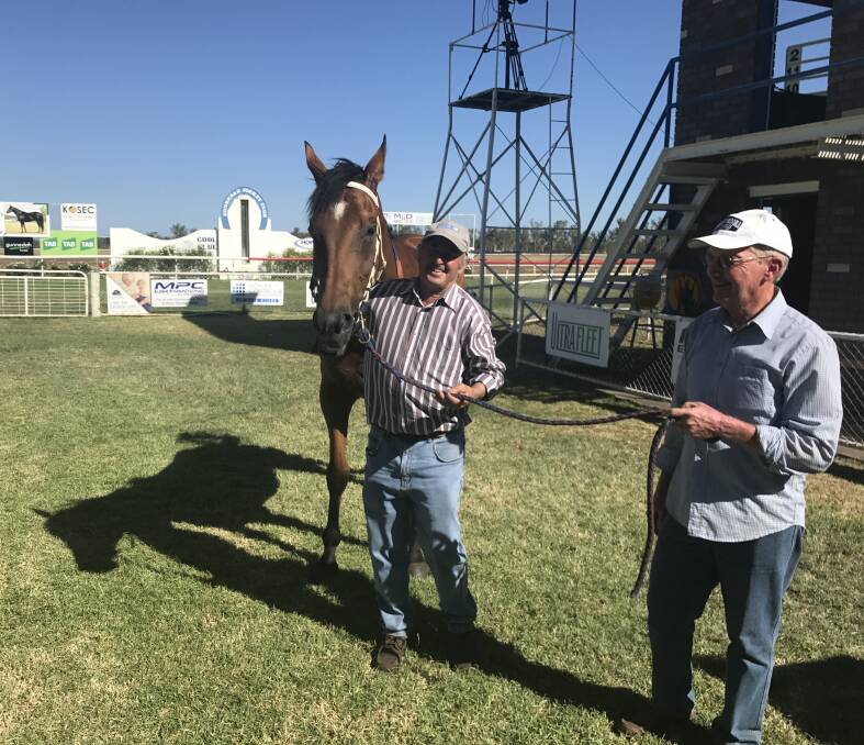 Justin Blanch and strapper Wayne McCormack (right) with Bob's A Dazzler after winning the Gunnedah Summer Cup.
