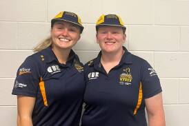 Erika Maslen (right), pictured here with fellow debutant Bonnie Brewer, is understandably all smiles after being presented with her ACT Brumbies cap. Picture supplied.