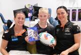 Taj Fitzgibbon with Tamworth's own West Tiger, Claudia Nielsen, and NRLW team-mate Botille Vette-Welsh. Picture by Gareth Gardner