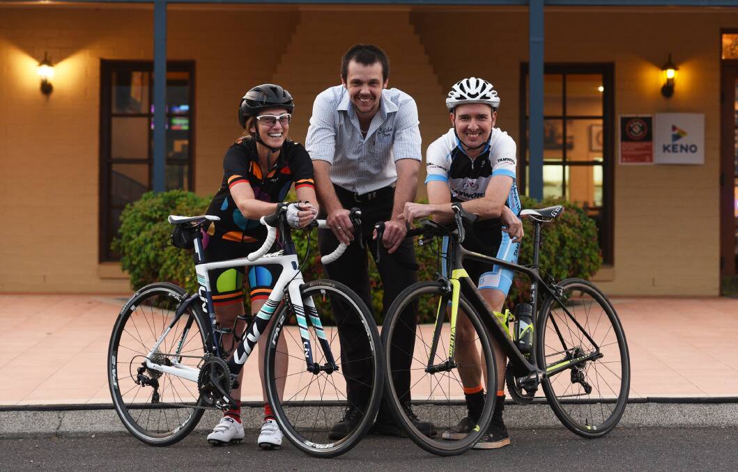 Wheels up: Anne Greenwood (left) and Luke O'Connor (right) with Jarrod Abra, representing sponsor Calala Inn, are ready for Sunday's Nemingha to Nundle. 