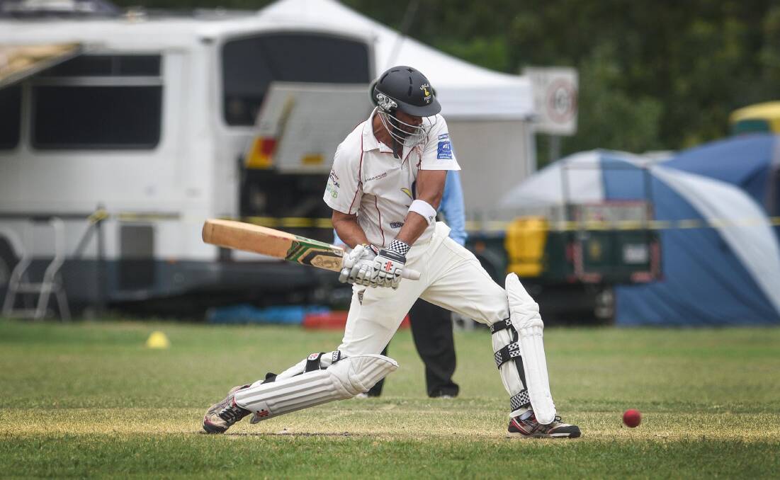 Top effort: Dave Mudaliar goes on the drive. The West Tamworth opener was named Tamworth's Cricketer of the Year. 