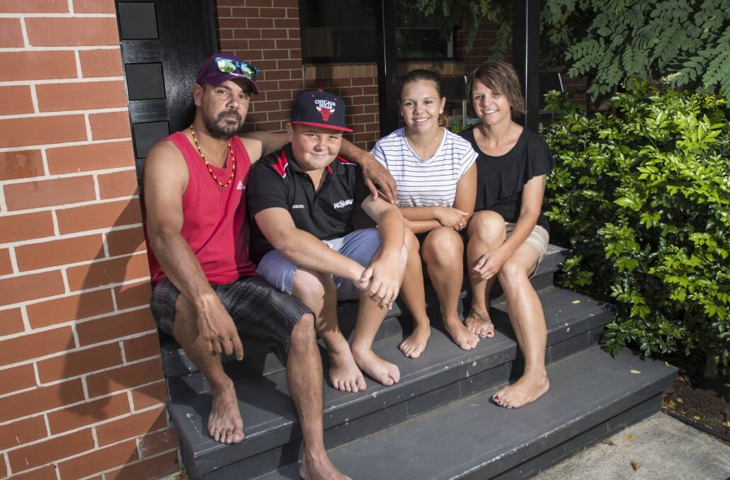 FAMILY MAN: New Bendemeer first-grade coach Anthony Hammond at home in Tamworth with his children, Preston, 12, and Dykota, 15, and his partner, Michelle Clare. Photo: Peter Hardin