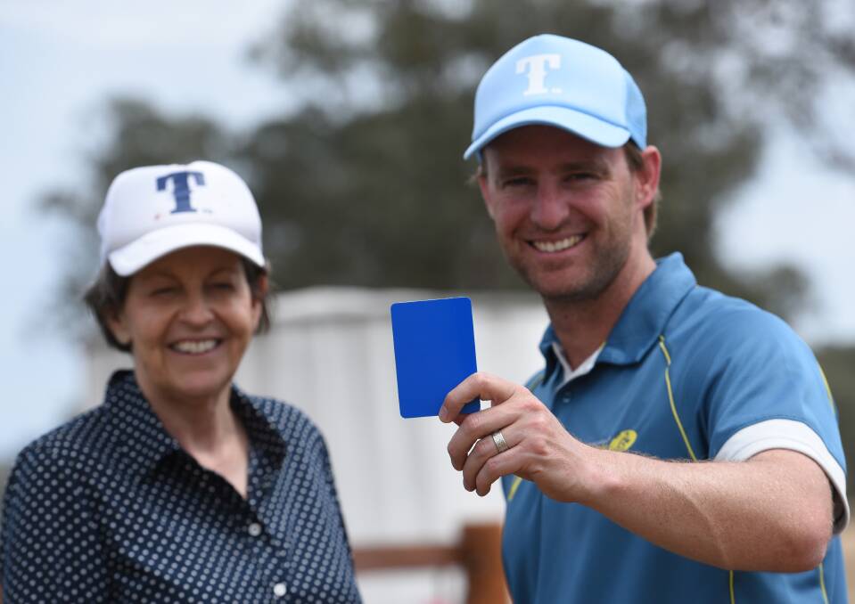 Dr Andrew Gardner holds the blue card which the Nick Tooth Foundation, pictured is Julie Tooth, are helping to implement. Photo: Gareth Gardner