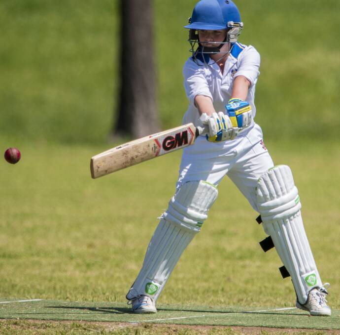Strokeplay: Hunter Valley's Bailey Borrow cuts at this ball during his 14 side's win over Mid North Coast on Sunday. Photo: Peter Hardin 021016PHA172