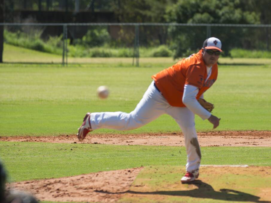 Pitching in:Jeremy Bird had a busy day on the mound for Armidale Black in Saturday's grand final pitching the entire game. Photo: Peter Hardin 170916PHC086