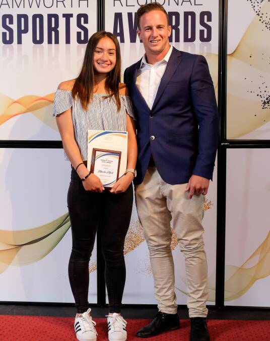 Golden moment: Swimmer Mikaela Short, here with special guest Lachlan Tame, was named Junior Sports Star of the Year. Photo: Chasing Summer Photography
