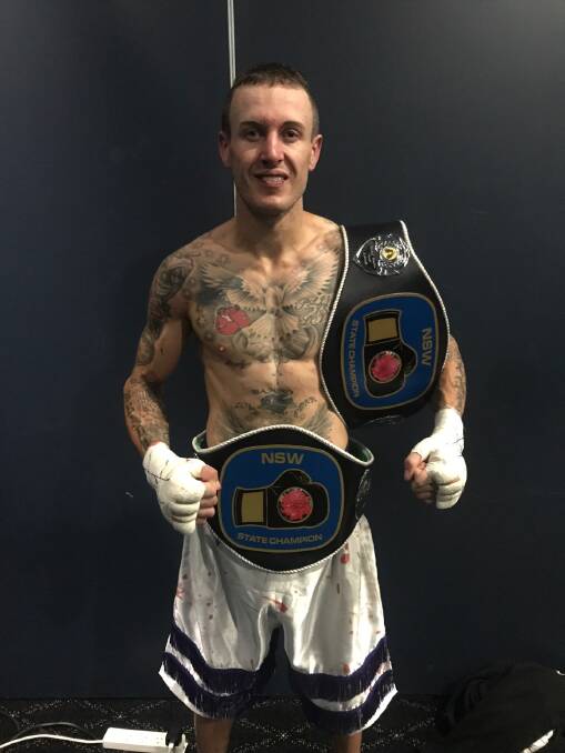 Champion: Tamworth's Michael Hamilton is now the NSW title holder in two divisions after winning the super featherweight earlier this month. 
