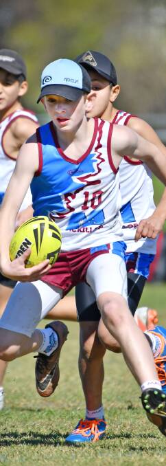High stepper: MacKillop's Max Jorgensen puts on a step for his team in yesterday's big win over hosts North West. Photo: Barry Smith 2607BSE17