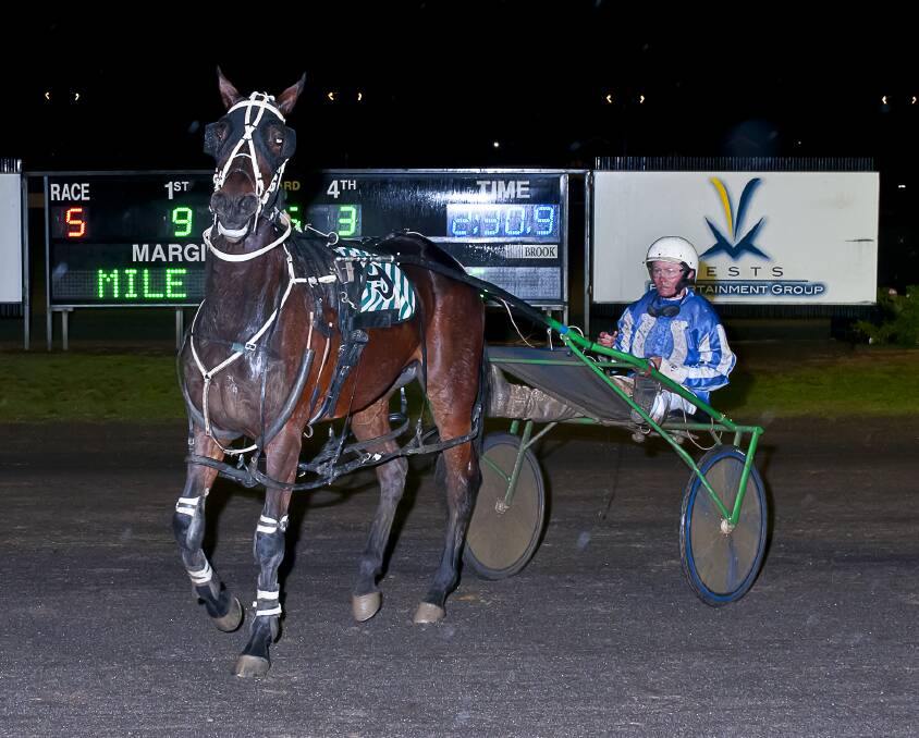 Top drive: Tom Ison and For Me return to scale after they romped to a 29.6m win in the Become A Tamworth HRC Member Pace at the Tamworth Harness Racing Club's meeting on Sunday. Photo: Peter Mac Photography