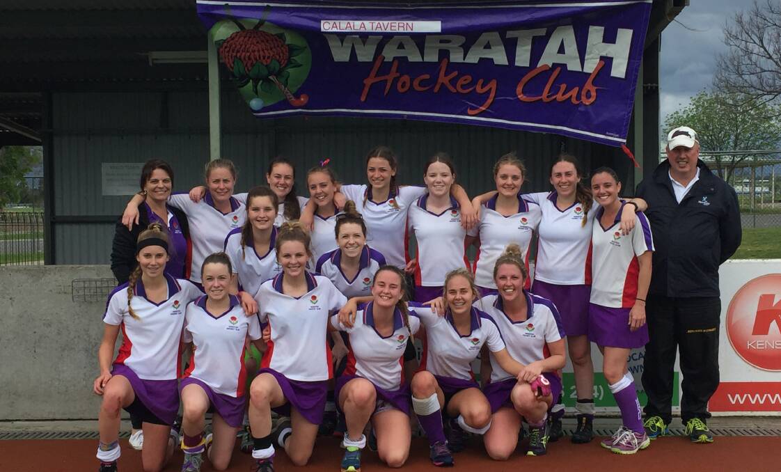 Two in a row: Waratahs celebrate back-to-back Tamworth women's first-grade titles after their three-goal win over Flames on Sunday.