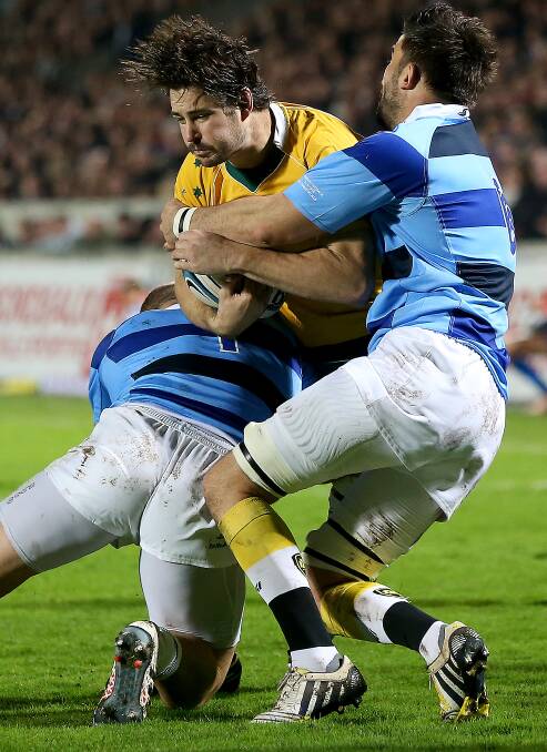 Hard hit: Sam Carter in action against the Baa Baas. Photo: Getty Images