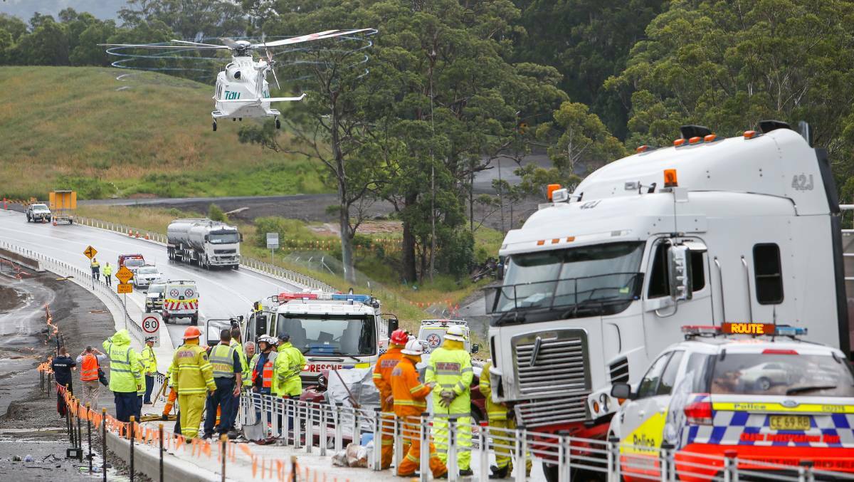 Emergency services at the crash site on the Princes Highway in Berry. Photo: Adam McLean