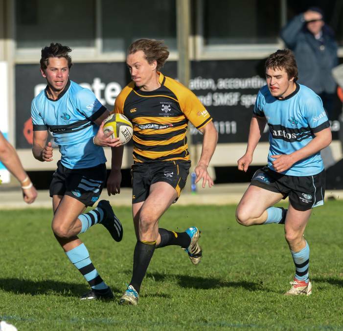 Runaway: Pirates outside centre Mitch Bath bursts into space as Narrabri's Percy Duncan (left) and Henri Knight (right) gives chase during the major semi-final.